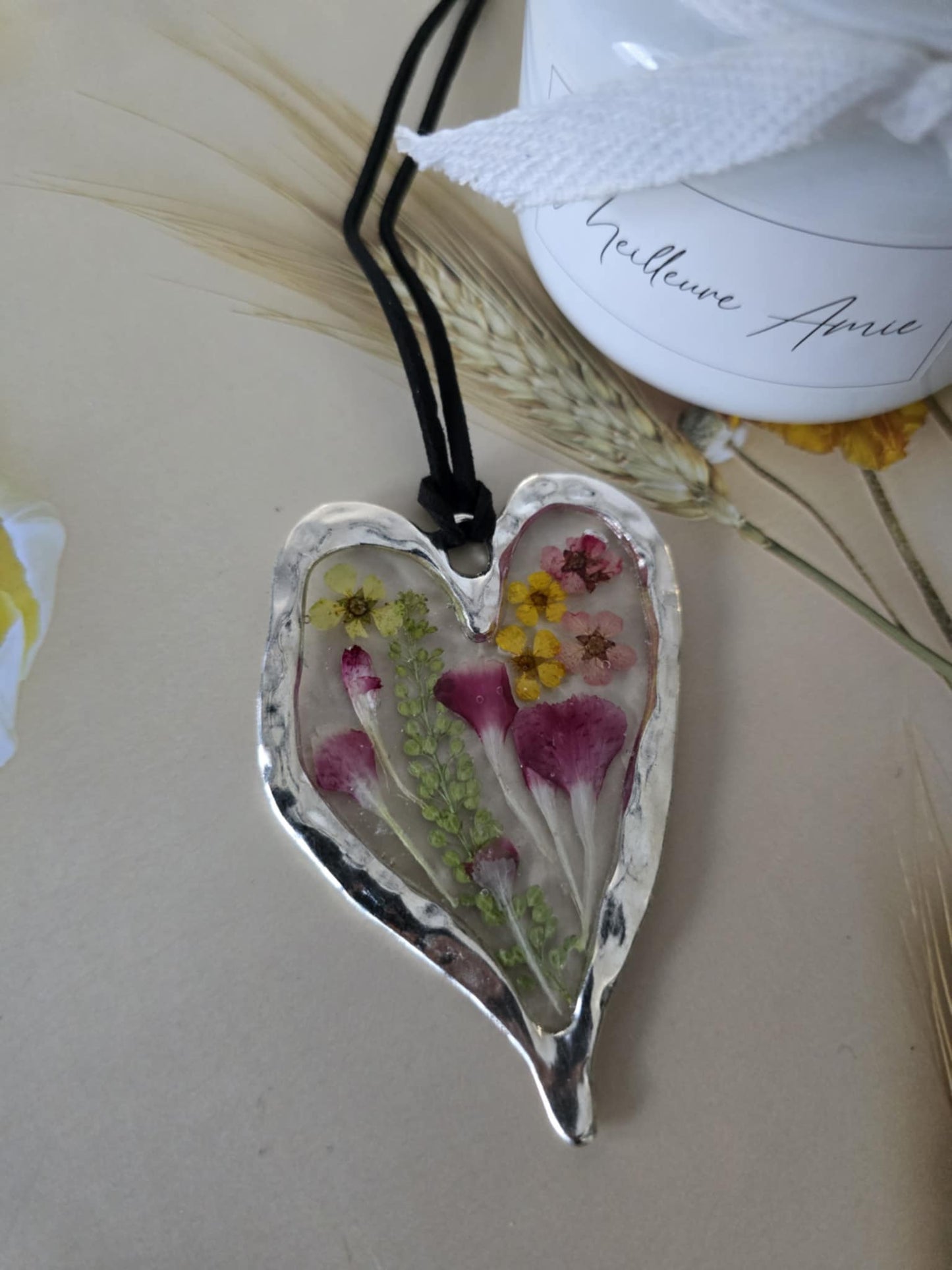 pendentif argenté floraison