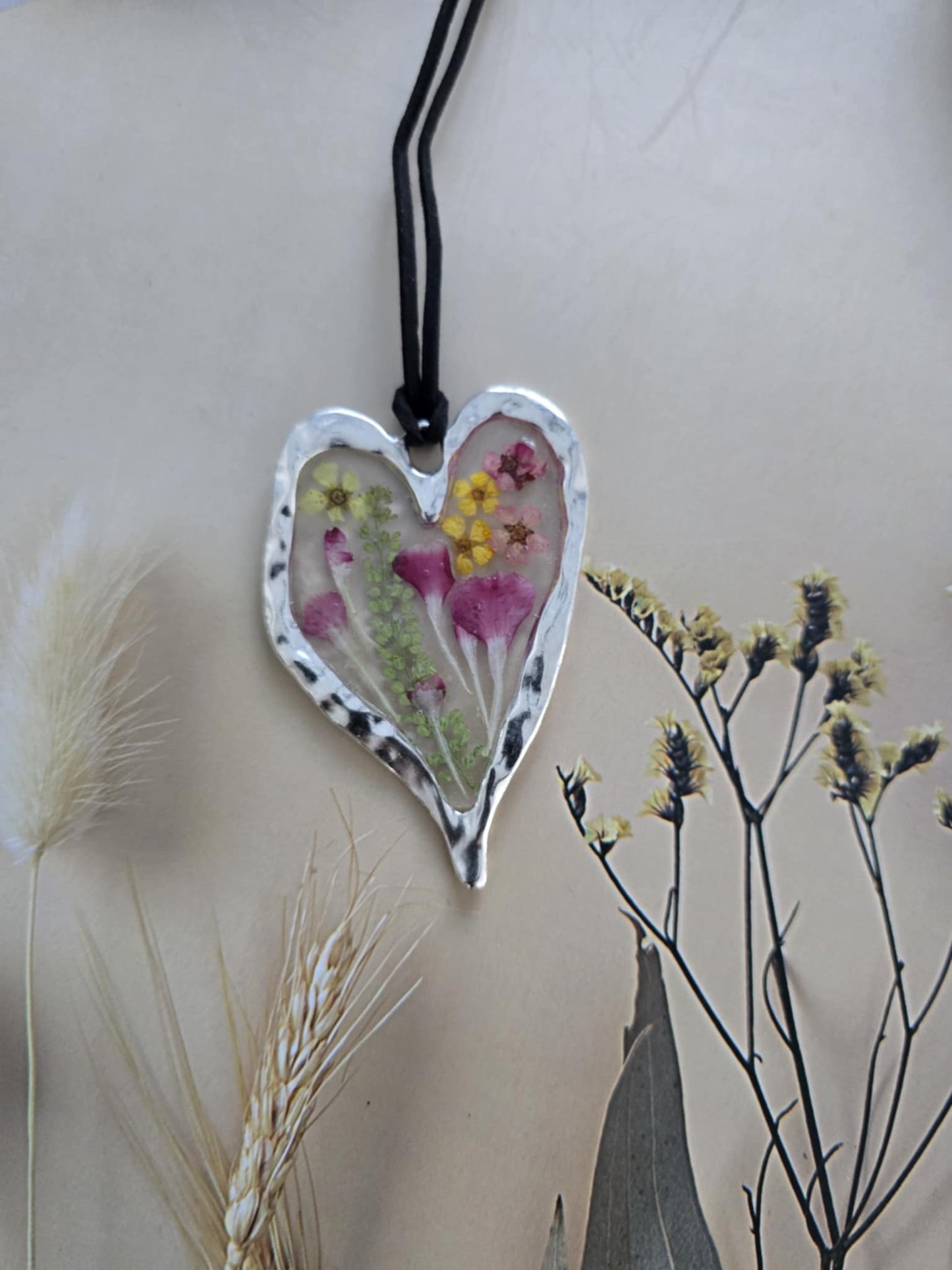 pendentif argenté floraison