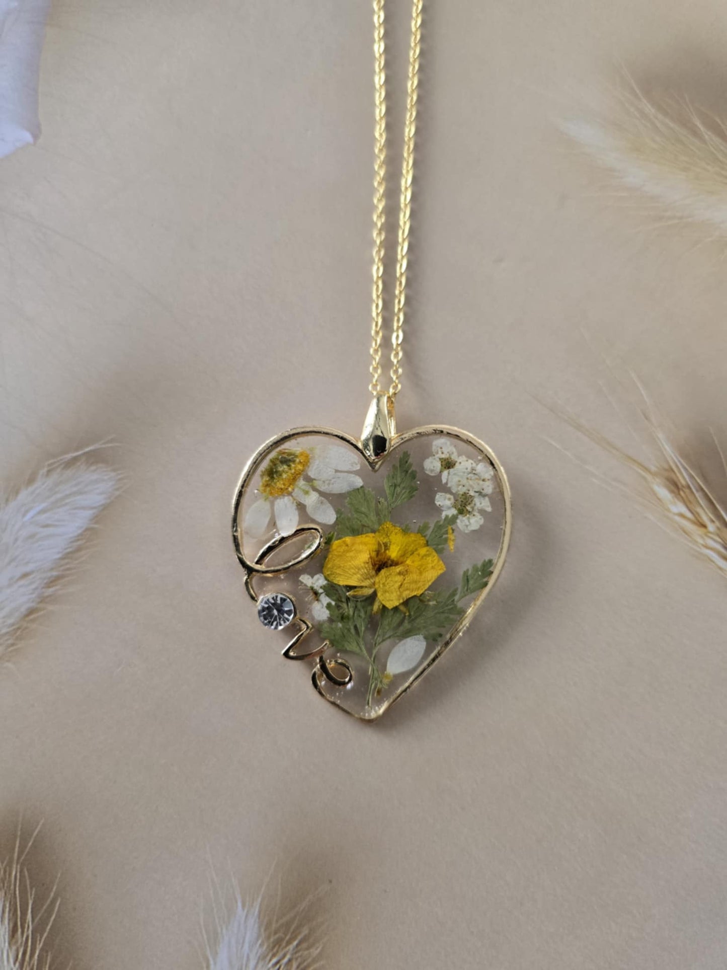 Pendentif coeur jaune