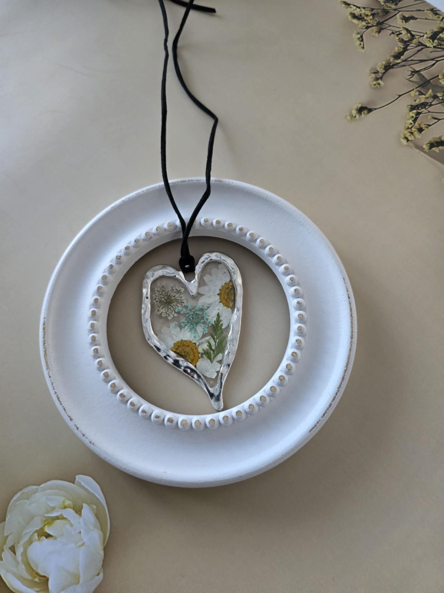 pendentif argenté floral fraiche