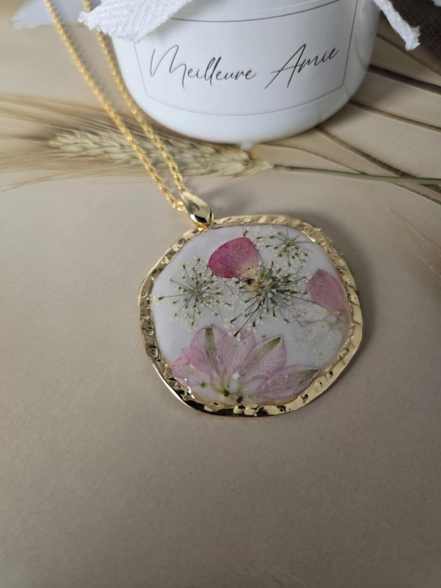 Pendentif touche de douceur en fleur