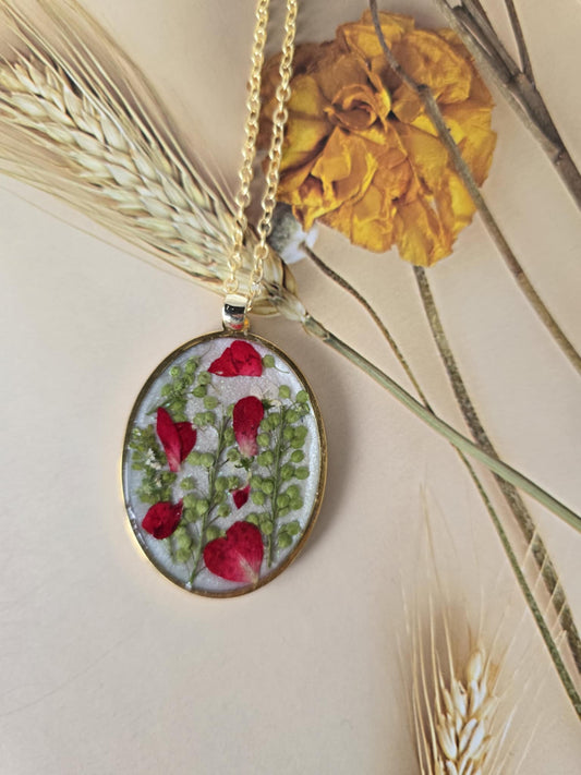 pendentif nacré blanc petite fleur rouge