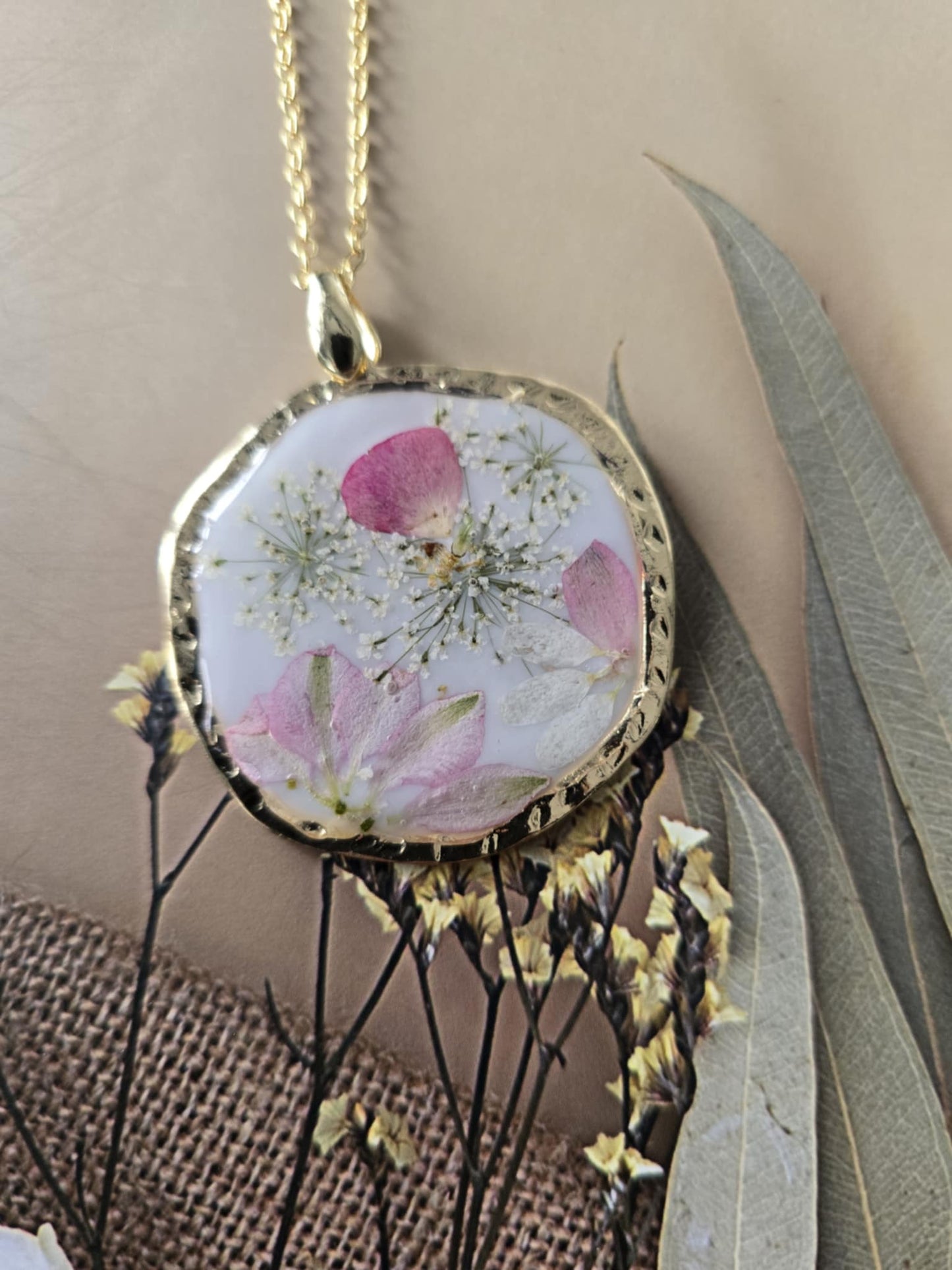 Pendentif touche de douceur en fleur