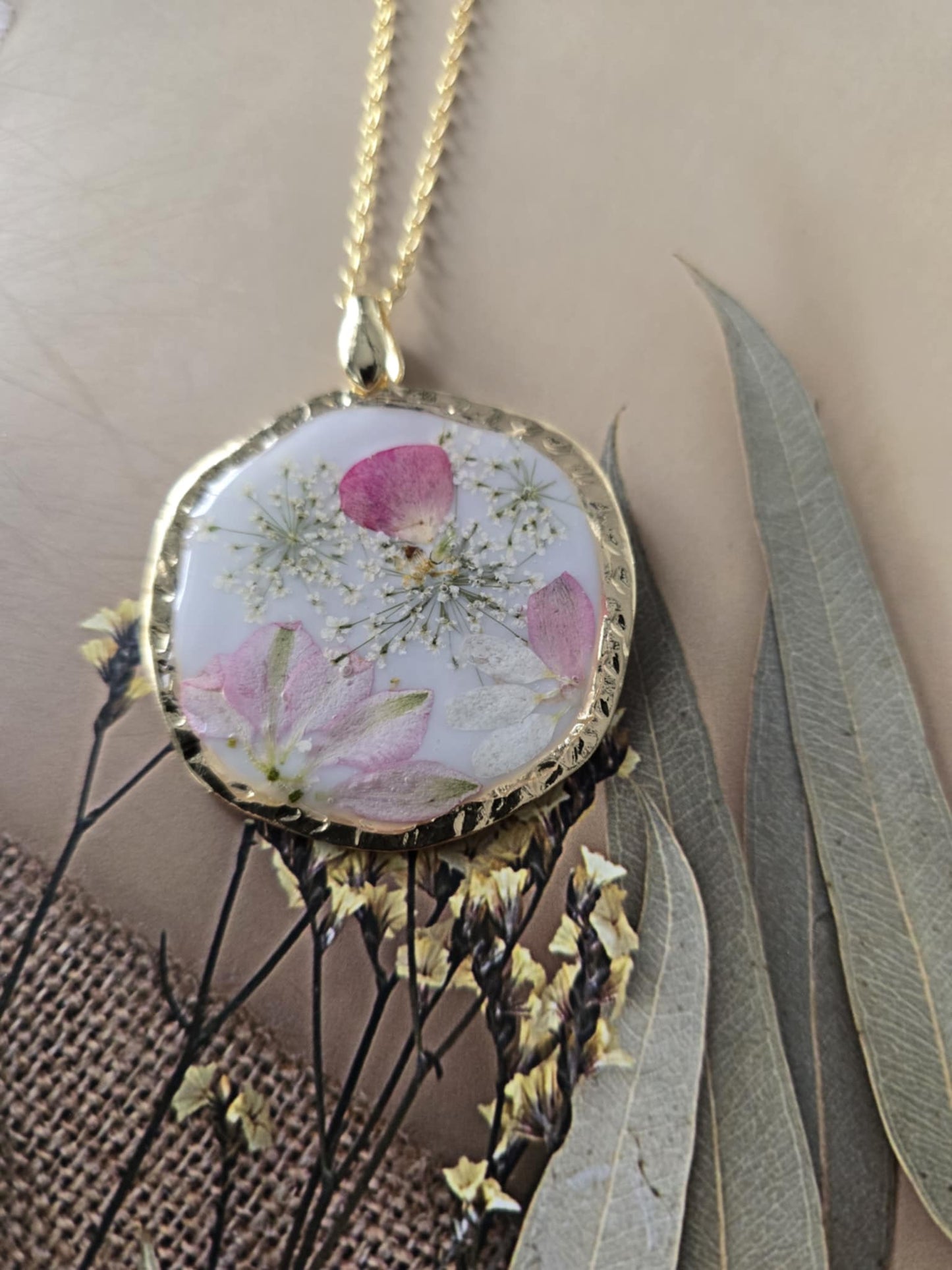 Pendentif touche de douceur en fleur