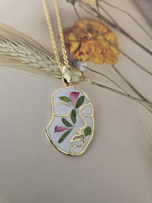 Pendentif floral visage