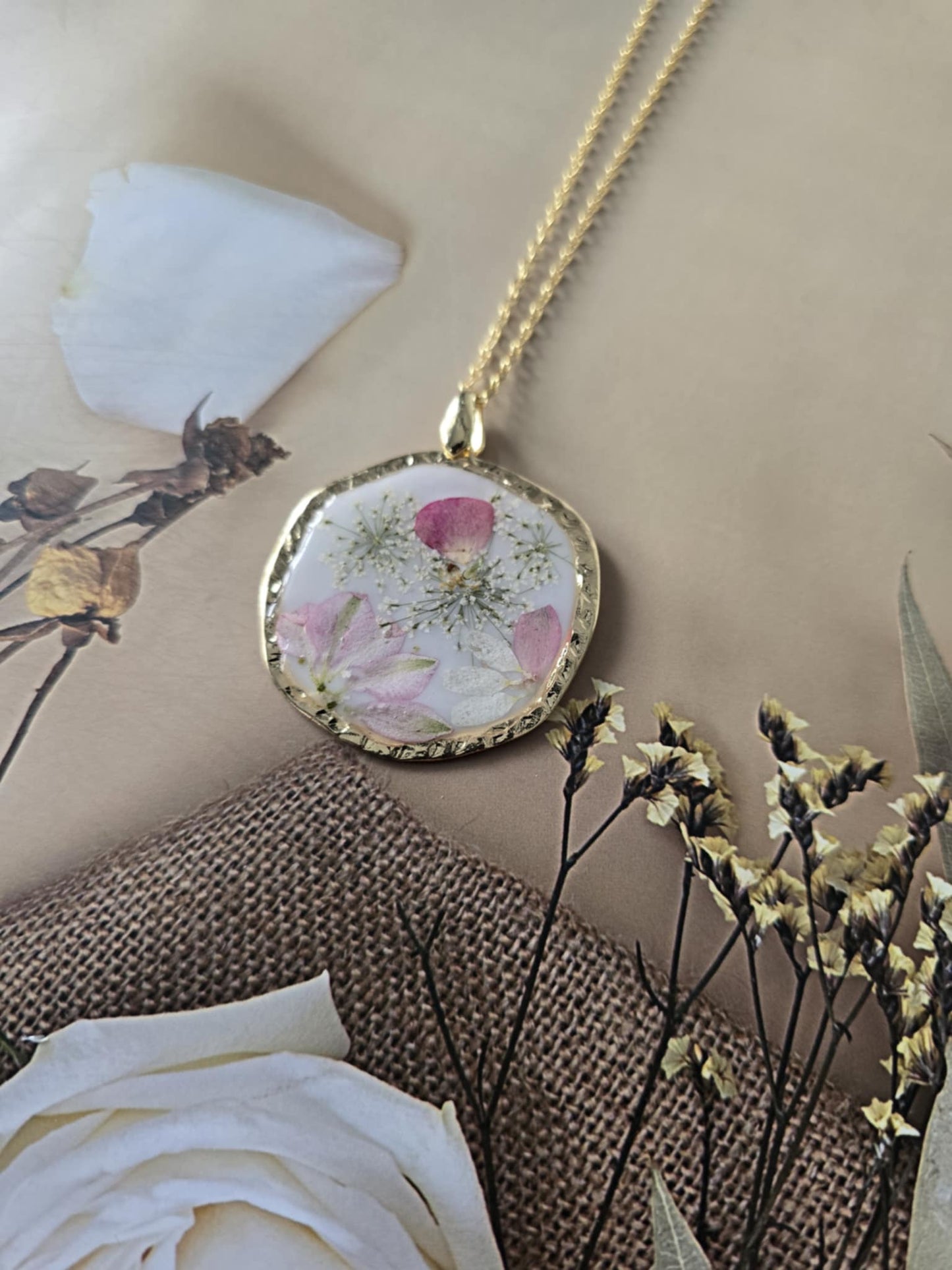 Pendentif touche de douceur en fleur
